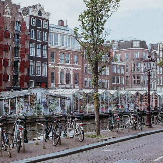 Bicycles parked at one of Amsterdam's historic canals
