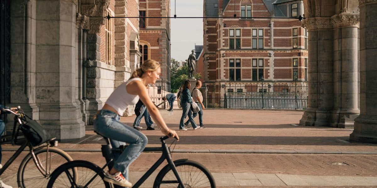 a tourist on a bike in amsterdam