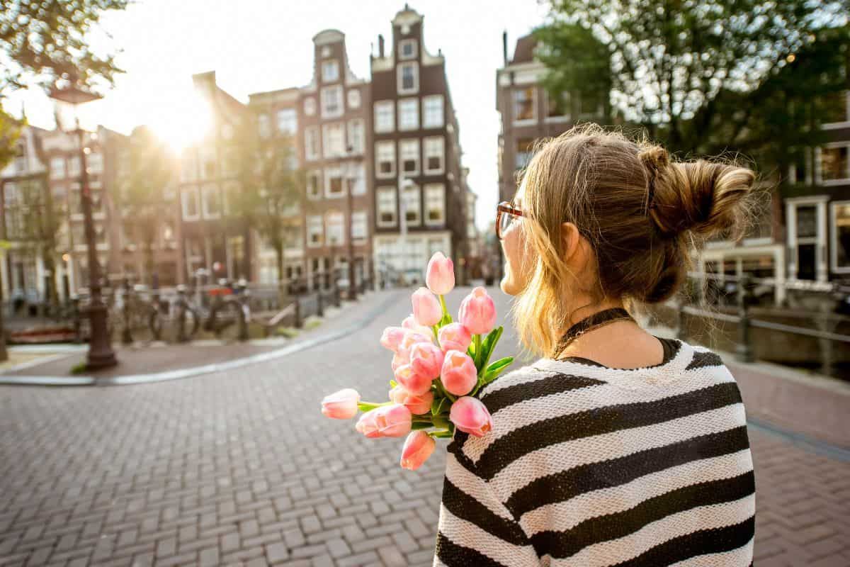 girl with flowers in amsterdam