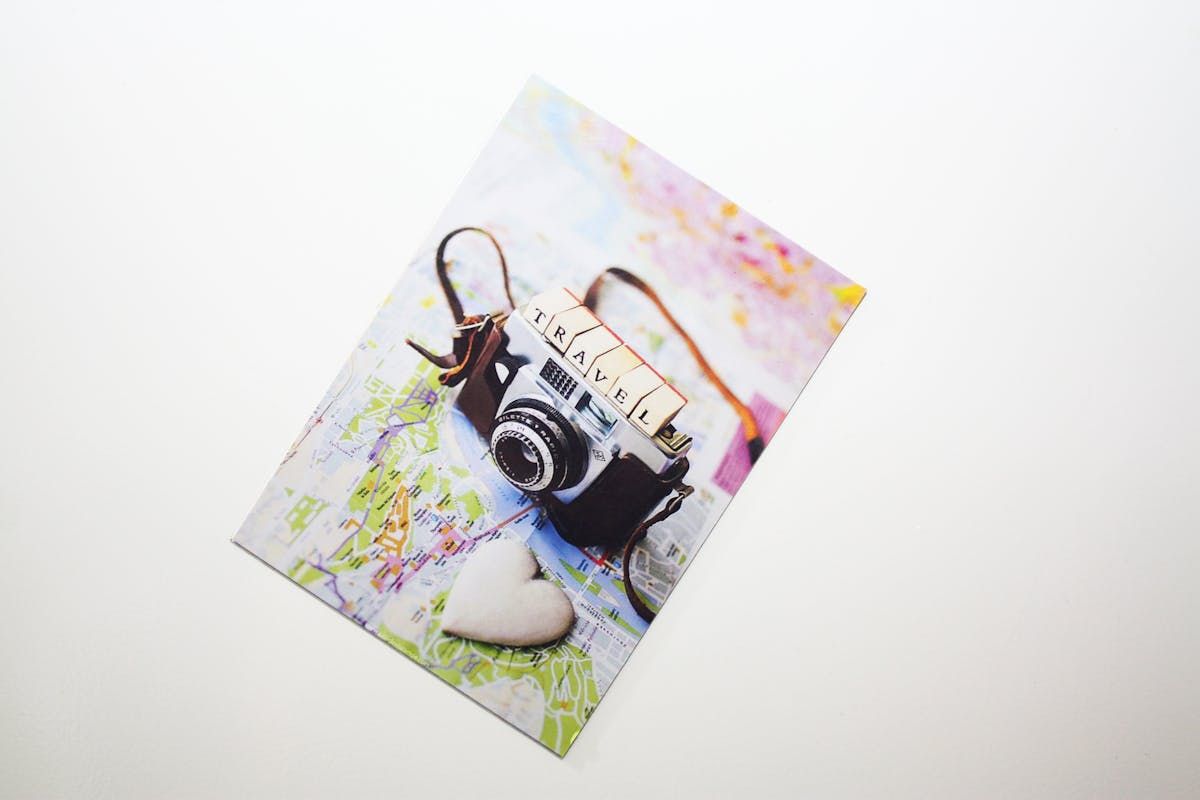 Postcard with a camera on it