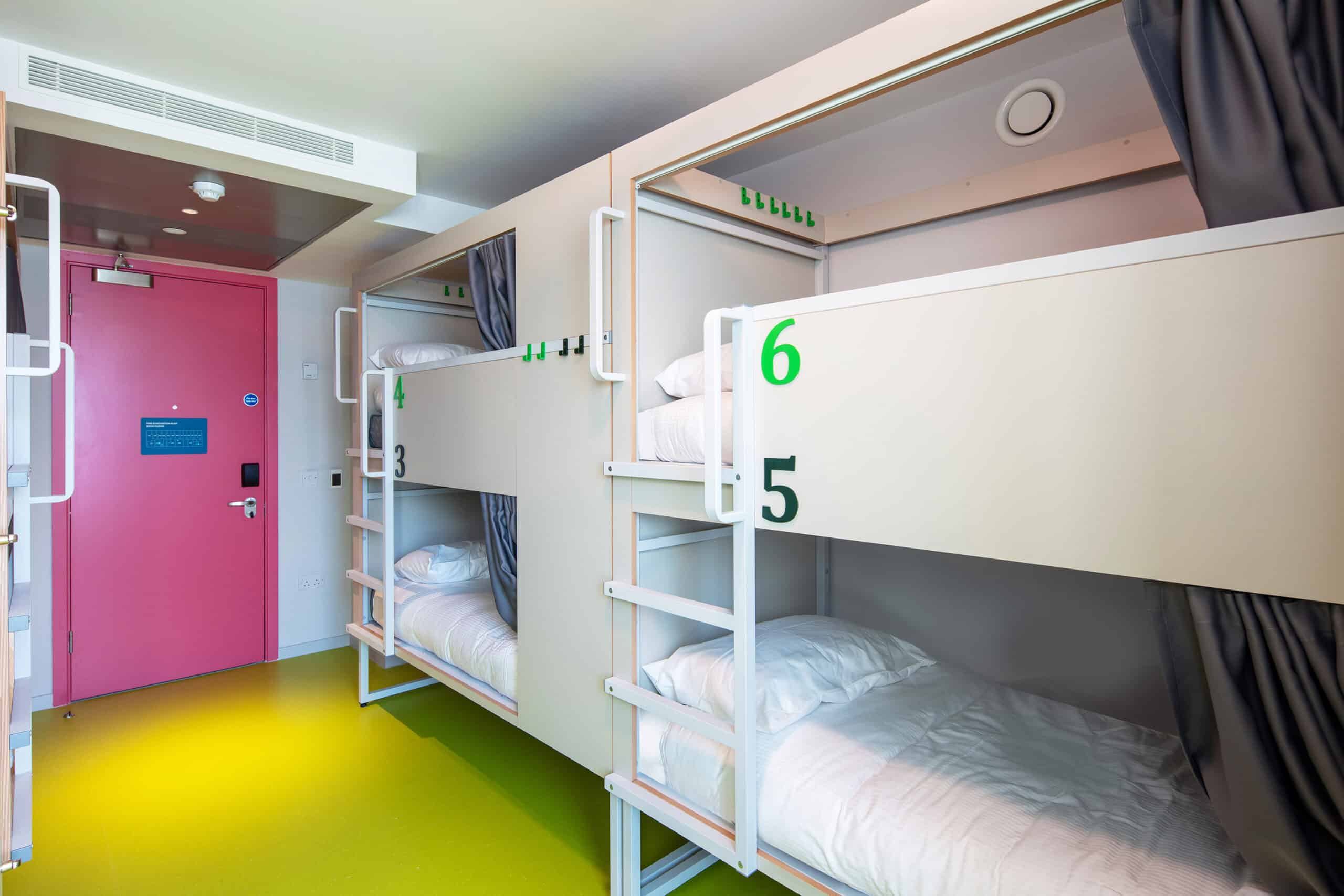 Group dorm room with bunk beds at Clink i Lár hostel