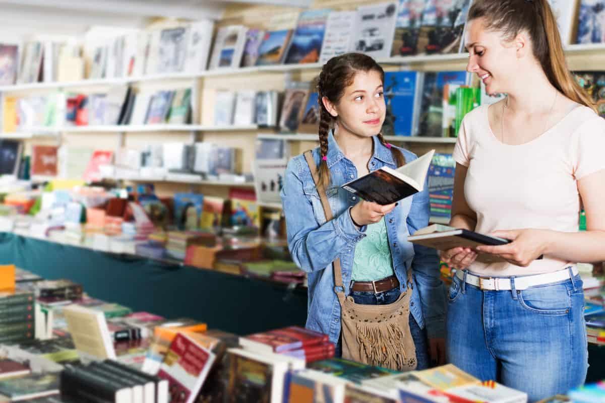 friends shopping in a book store
