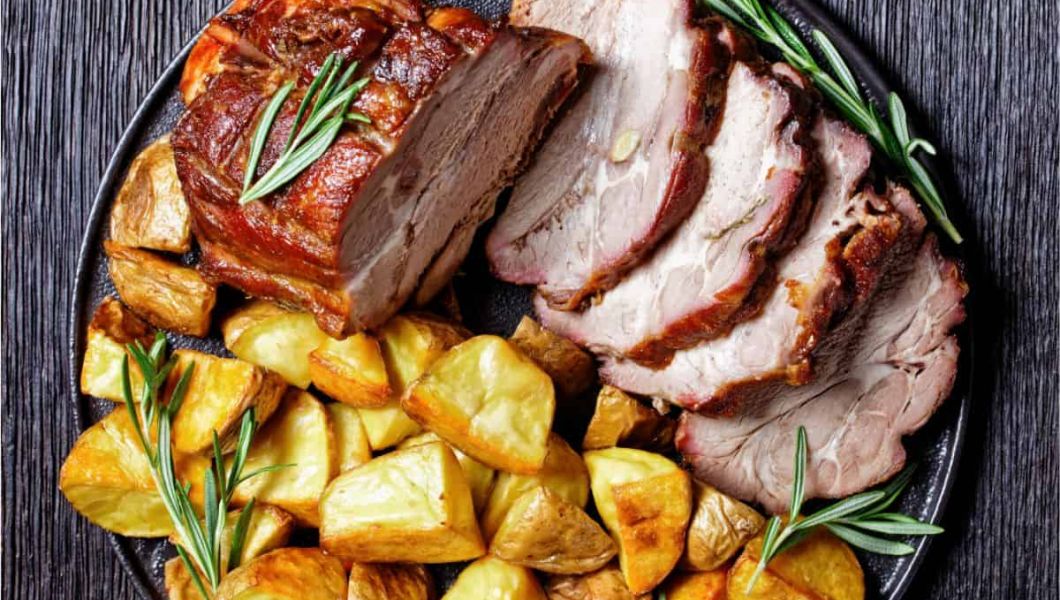 sunday roast dinner with meat and vegetables