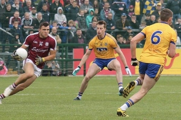 Gaelic football players on the pitch