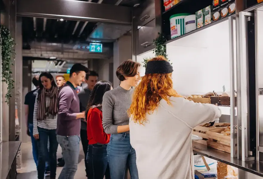 Guests queuing at the breakfast counter