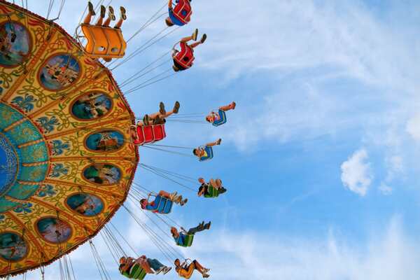 people on a funfair ride
