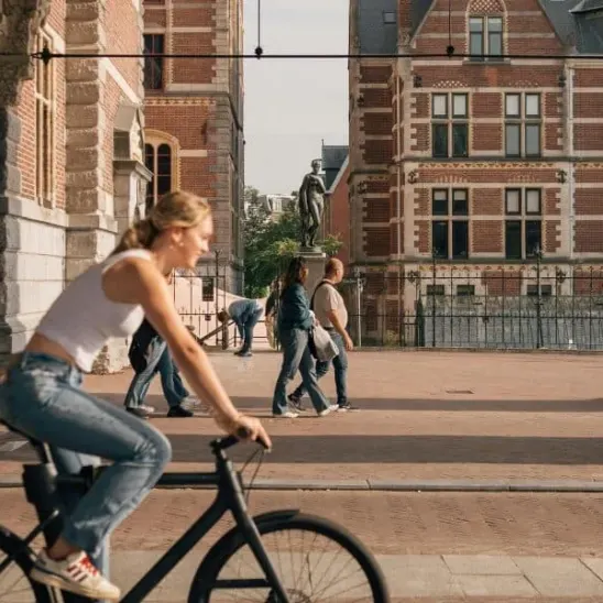 a tourist on a bike in amsterdam