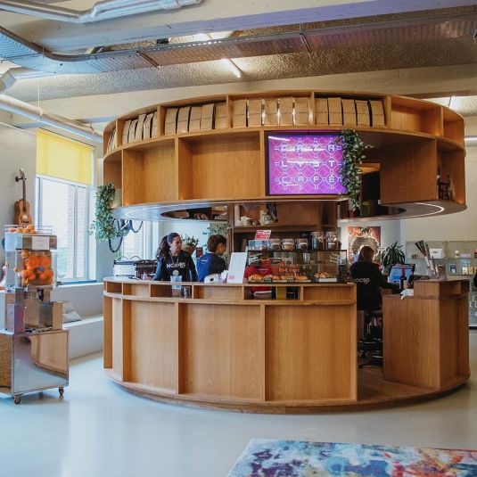 the reception area at ClinkNOORD hostel in Amsterdam