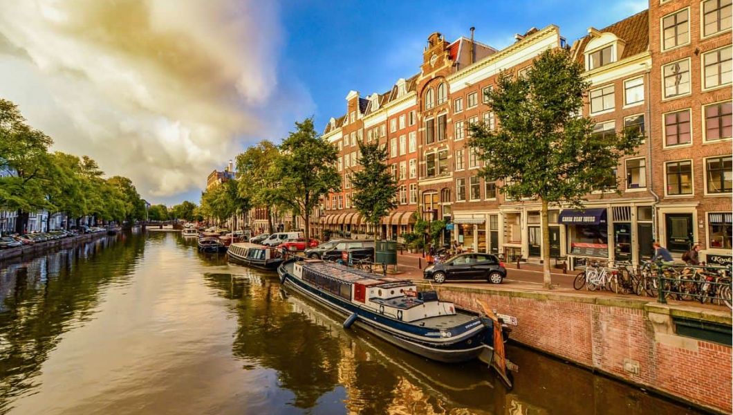 boats on the canal in amsterdam