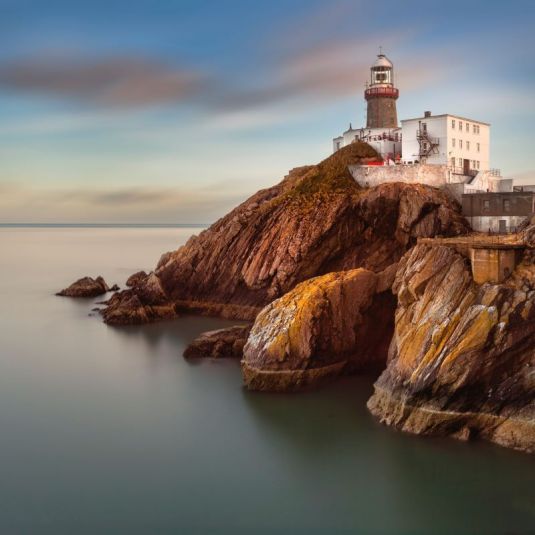 Dublin's famous Howth area facing the sea with a lighthouse on the cliff 