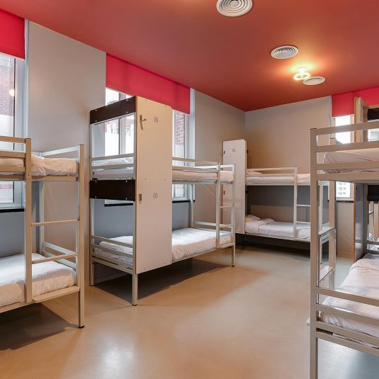 Bunk beds in a dorm room at ClinkNOORD hostel in Amsterdam